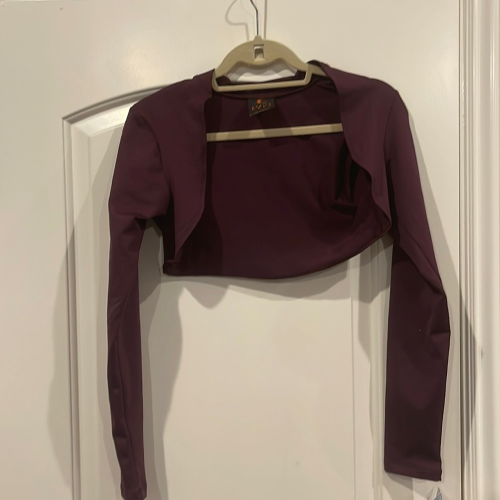 A burgundy shrug jacket.